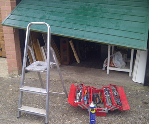 Garage door manual opening control